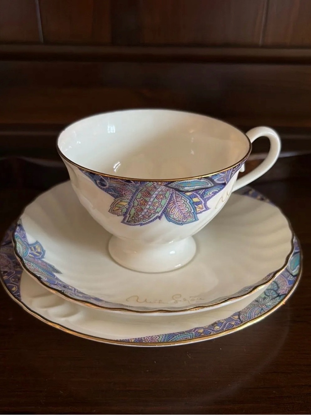 Elegant White Teacup and Saucer Set with Blue-Purple Paisley Accent